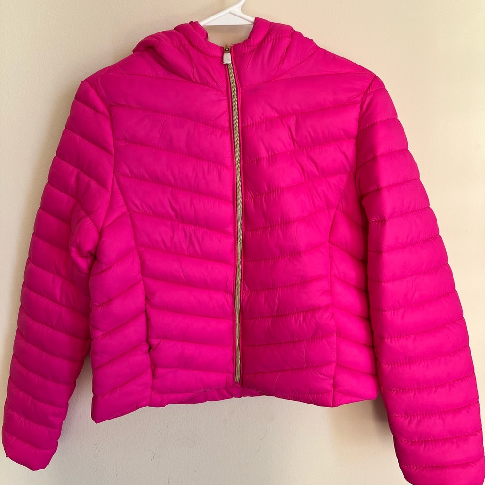 Hot pink spring jacket with golden zippers. Never been worn, medium sizing.